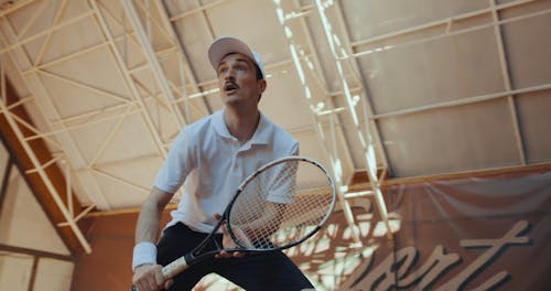 Person Practicing Tennis