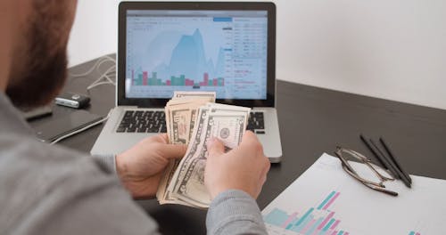 A Businessman Counting Money