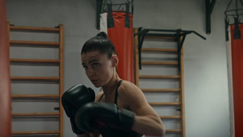 A Woman Training Her Boxing Skills