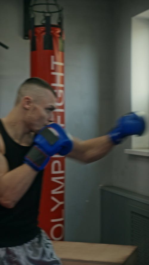 A Man Punching On Air Rapidly In Training · Free Stock Video
