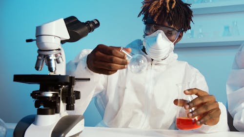 A Man Doing an Experiment