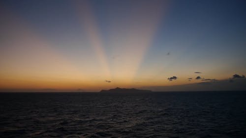 Wide Shot Video of The Rays of the Sun in the Horizon