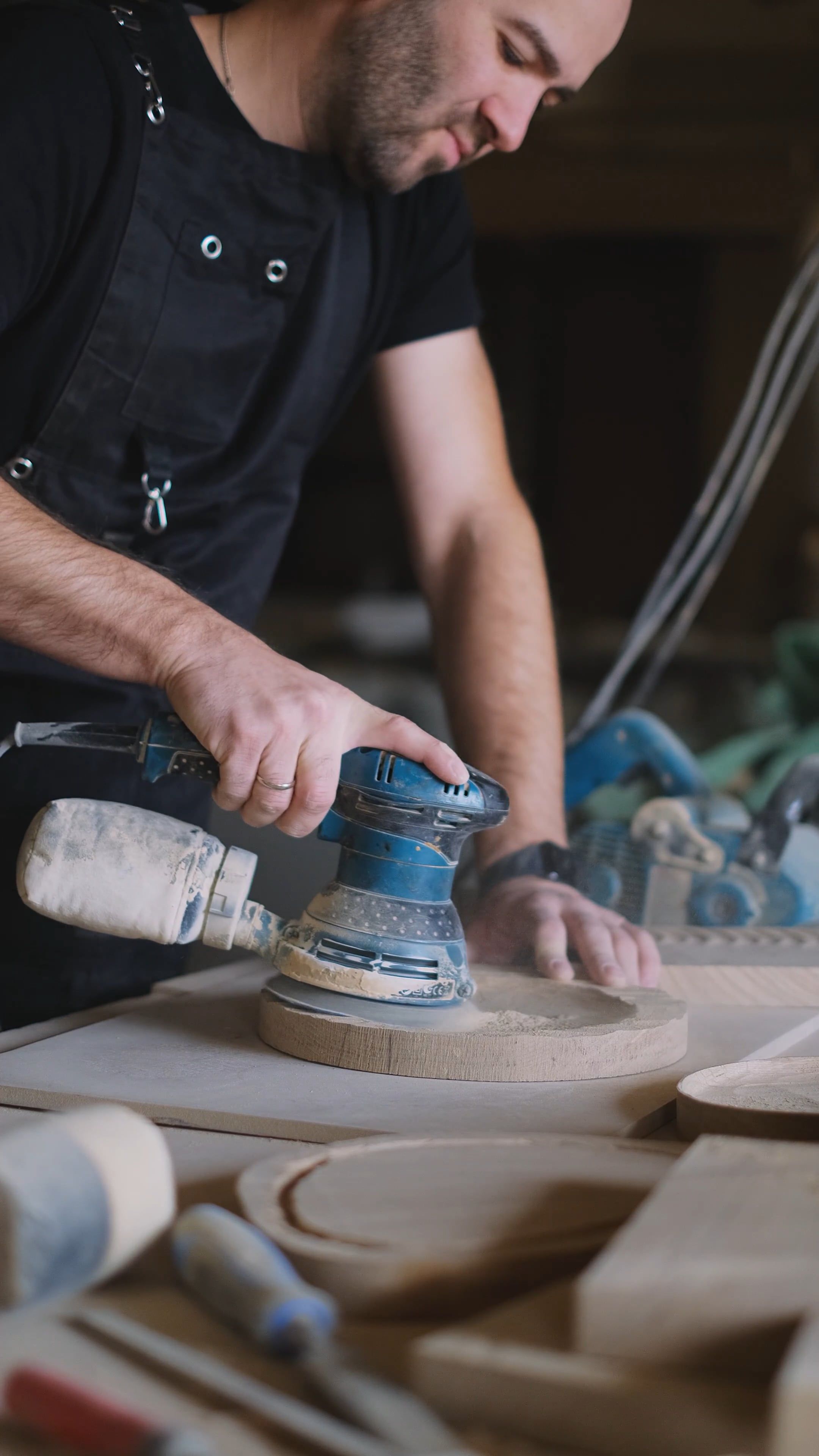 Carpenter Working Over A Wooden Disc Free Stock Video carpenter-working-over-a-wooden-disc-free-stock-video