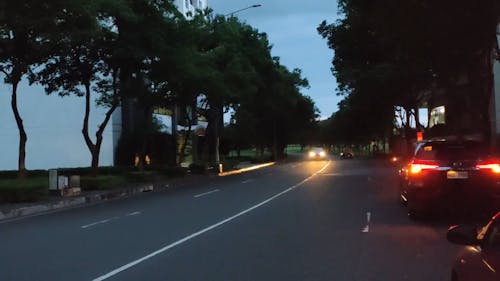 Vehicles on City Road at Night