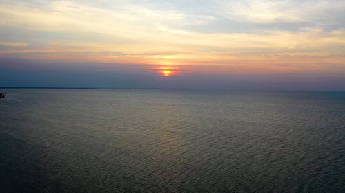 Scenic View of the Sunset Above the Sea