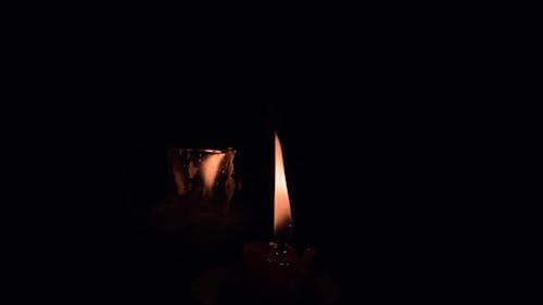 Burning Candles in the Dark