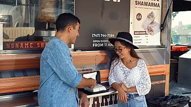 people eating street food