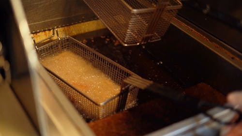 Deep Frying Potatoes in Boiling Oil