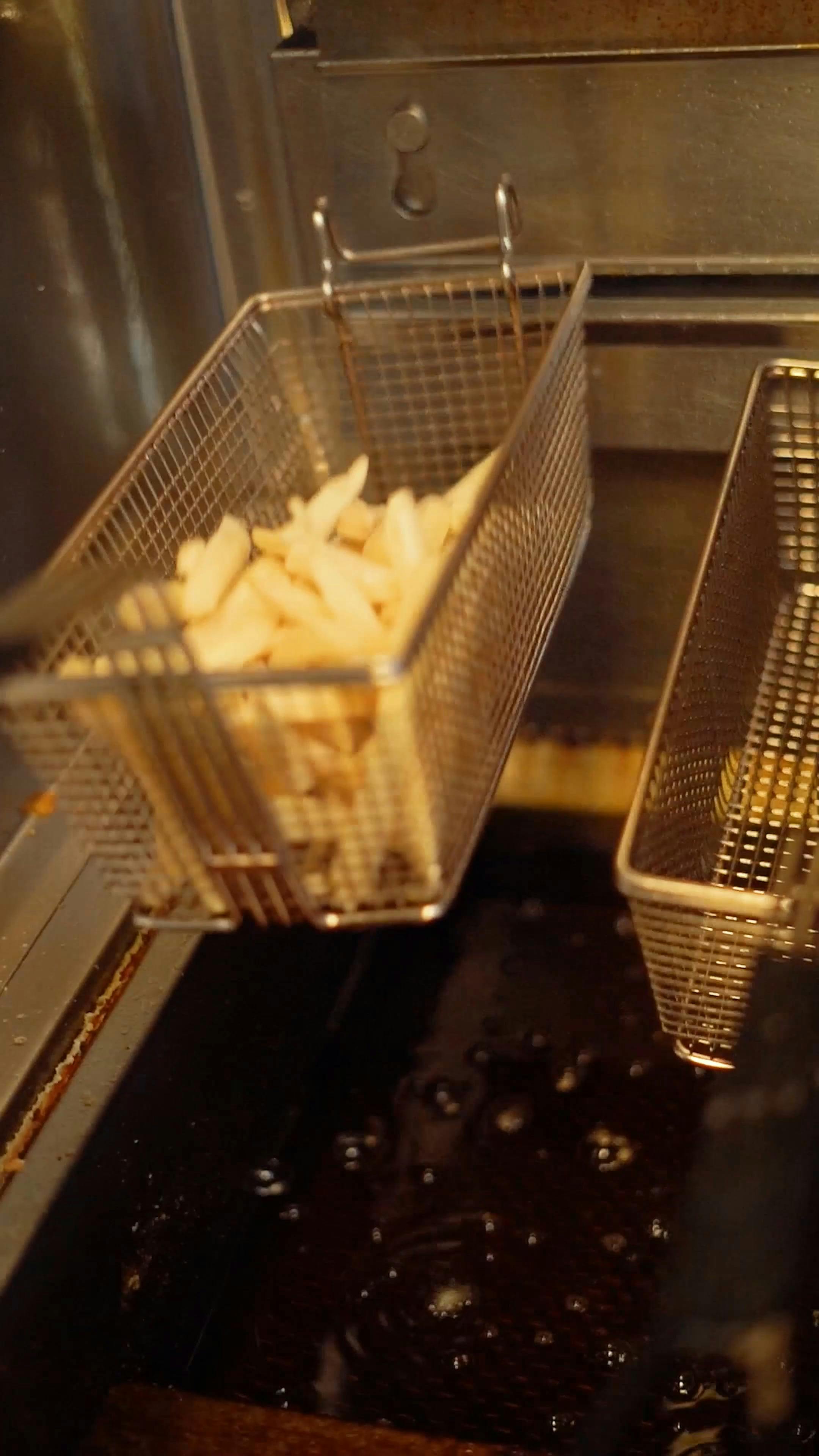 Deep Frying Potatoes in Boiling Oil Free Stock Video Footage, Royalty