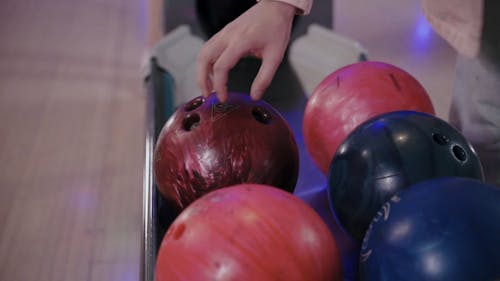 Friends Playing Bowling 