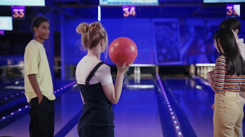 Friends Playing Bowling 