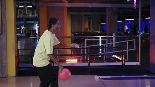 Male Teenager Playing Bowling