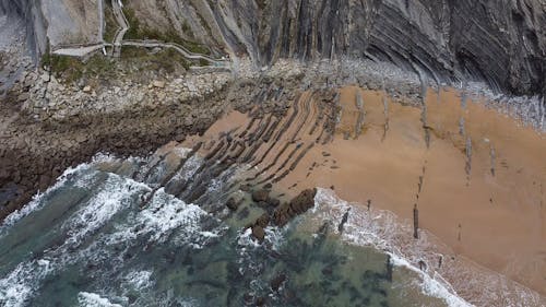 An Aerial Footage of a  Rocky Beach