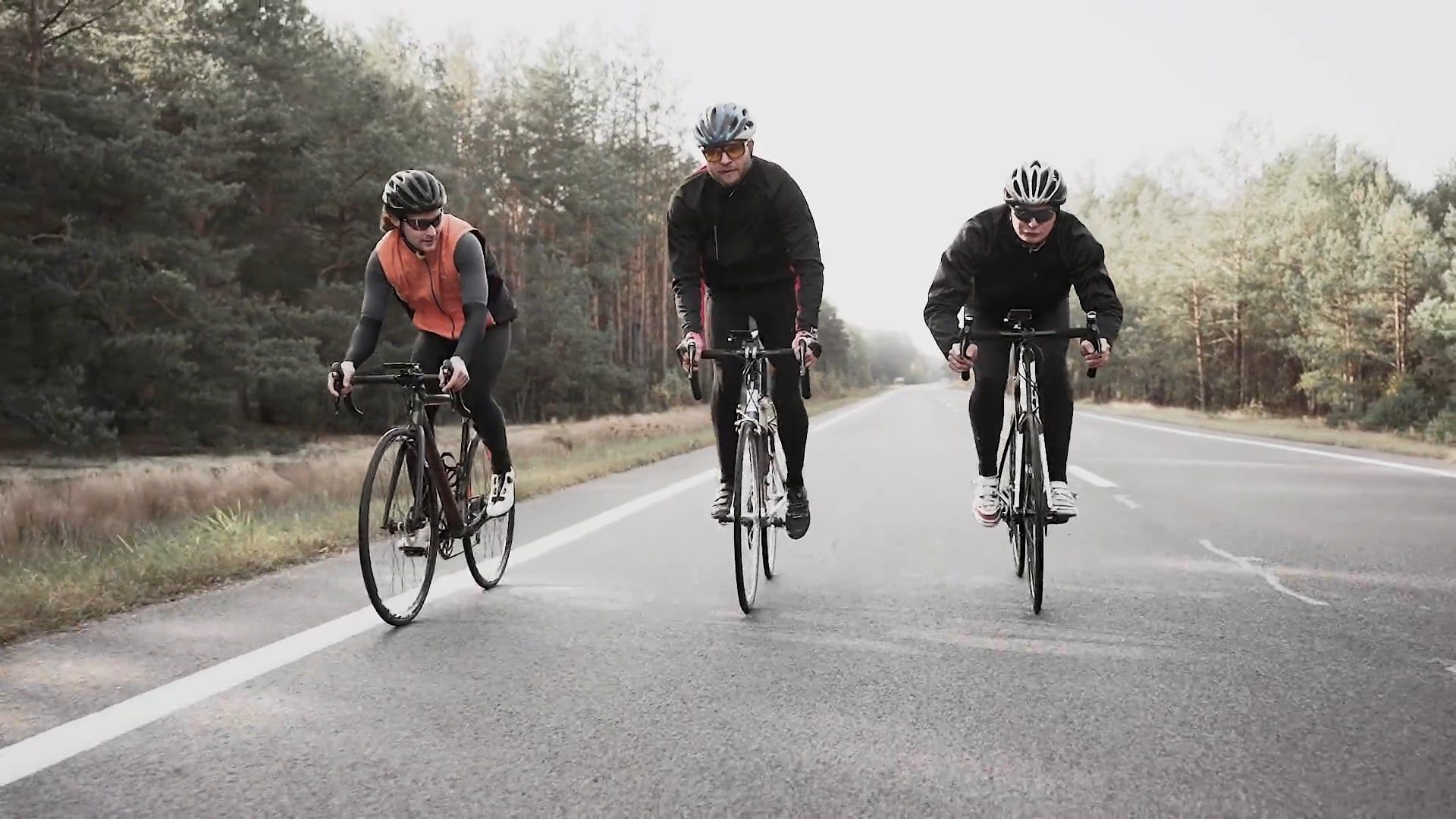 Three Cyclists on Road · Free Stock Video