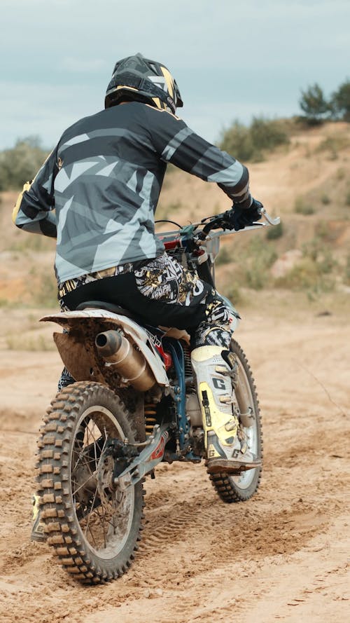 Motocyclist Truning on a Motocycle 