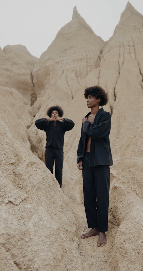 Two People Standing in the Desert Wearing Kimonos