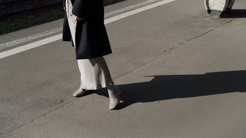 Woman Modeling in a Train Station 