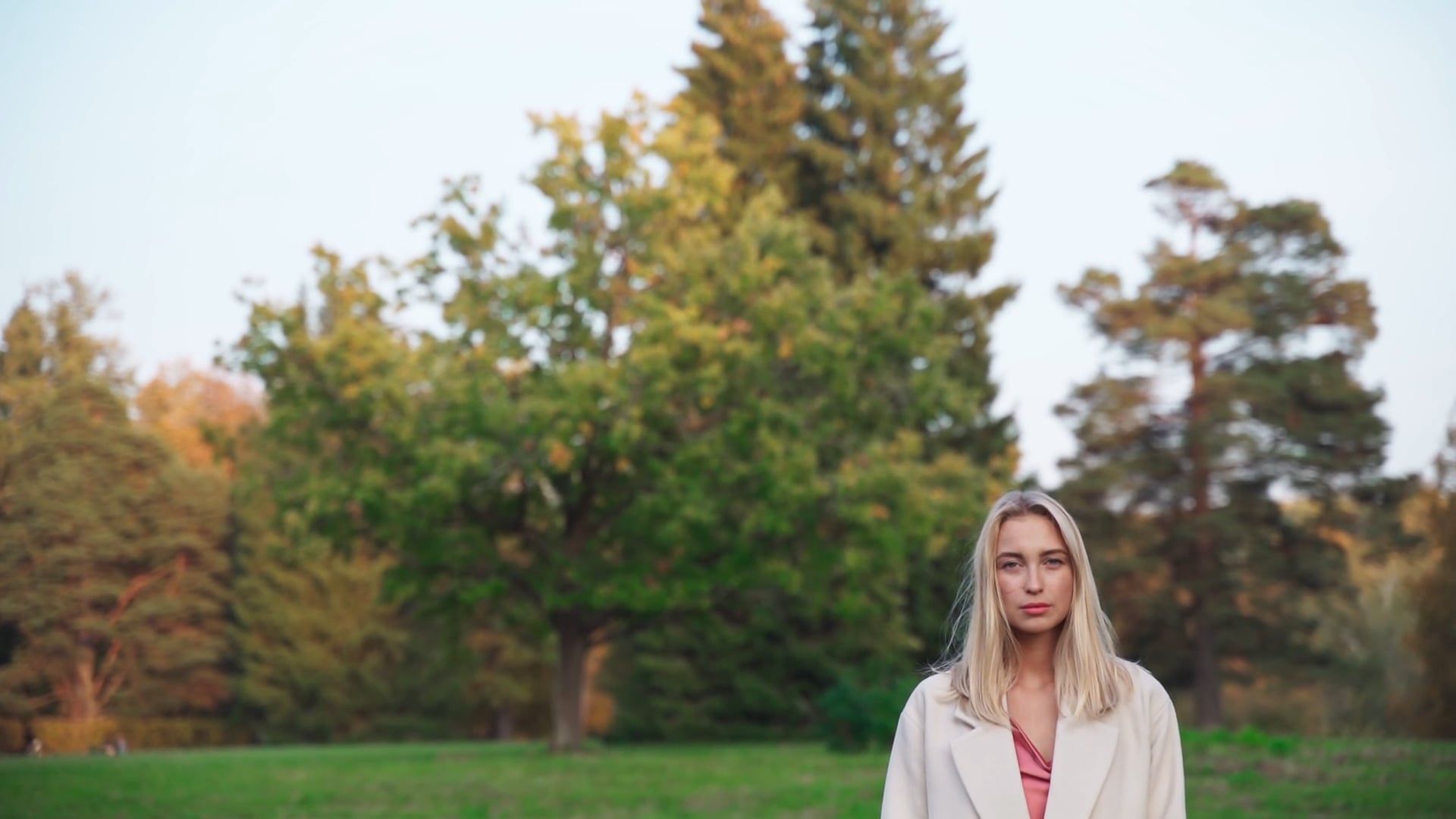 Young Woman Posing Outdoors Looking at Camera Free Stock Video Footage ...