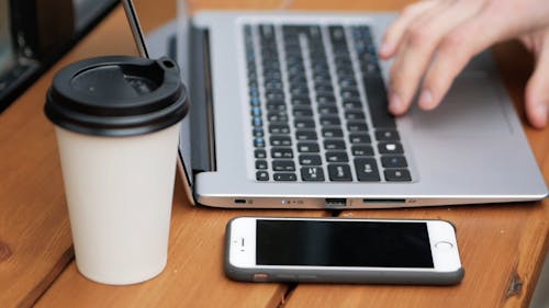 Video of a Person Typing in the Laptop