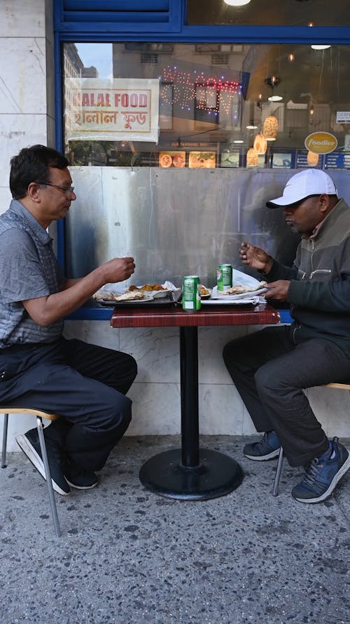 Men Eating Indian Food