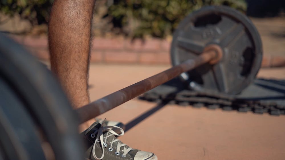 man-practicing-weight-lifting-free-stock-video