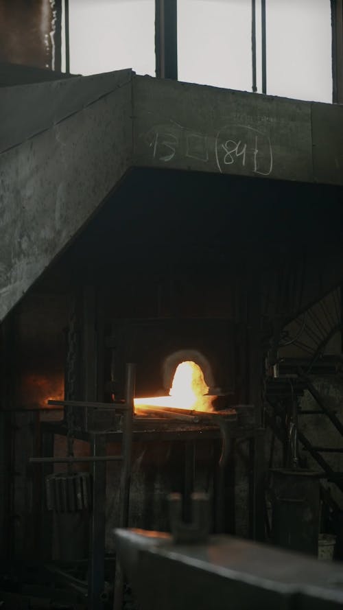 A Blacksmith Working over Iron