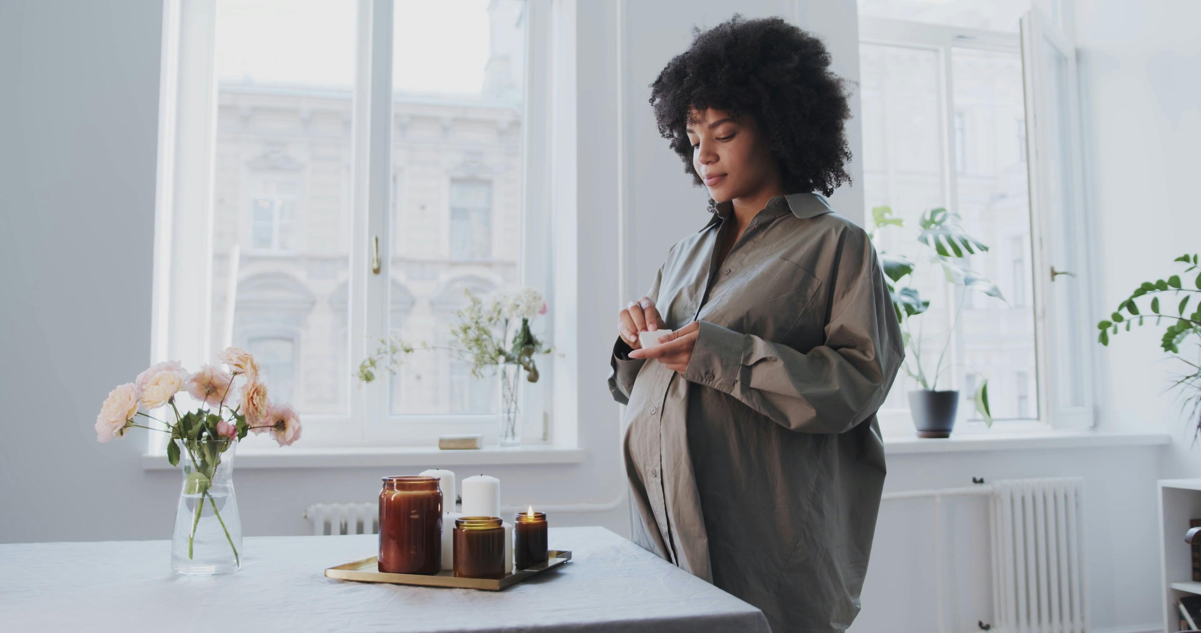 Pregnant Woman Lighting Candles · Free Stock Video