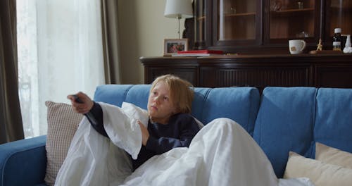 A Sick Kid Watching Television