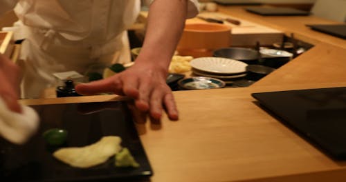A Person Preparing Japanese Cuisine
