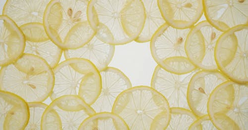 Person Placing a Lemon in the Middle 
