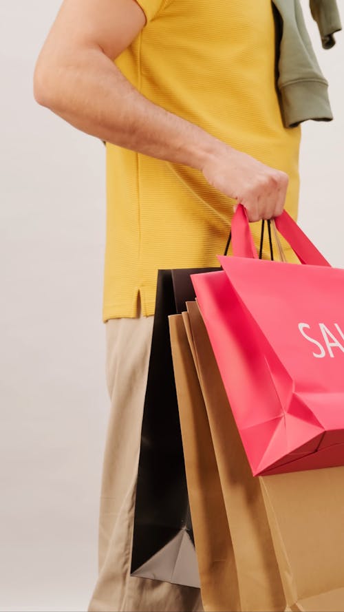 A Man Shopping For Sale Items