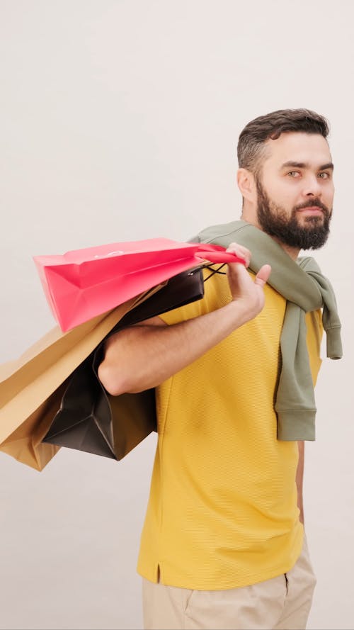 A Man Carrying Shopping Bags