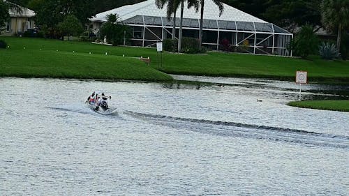 Boat Passing by the Lake