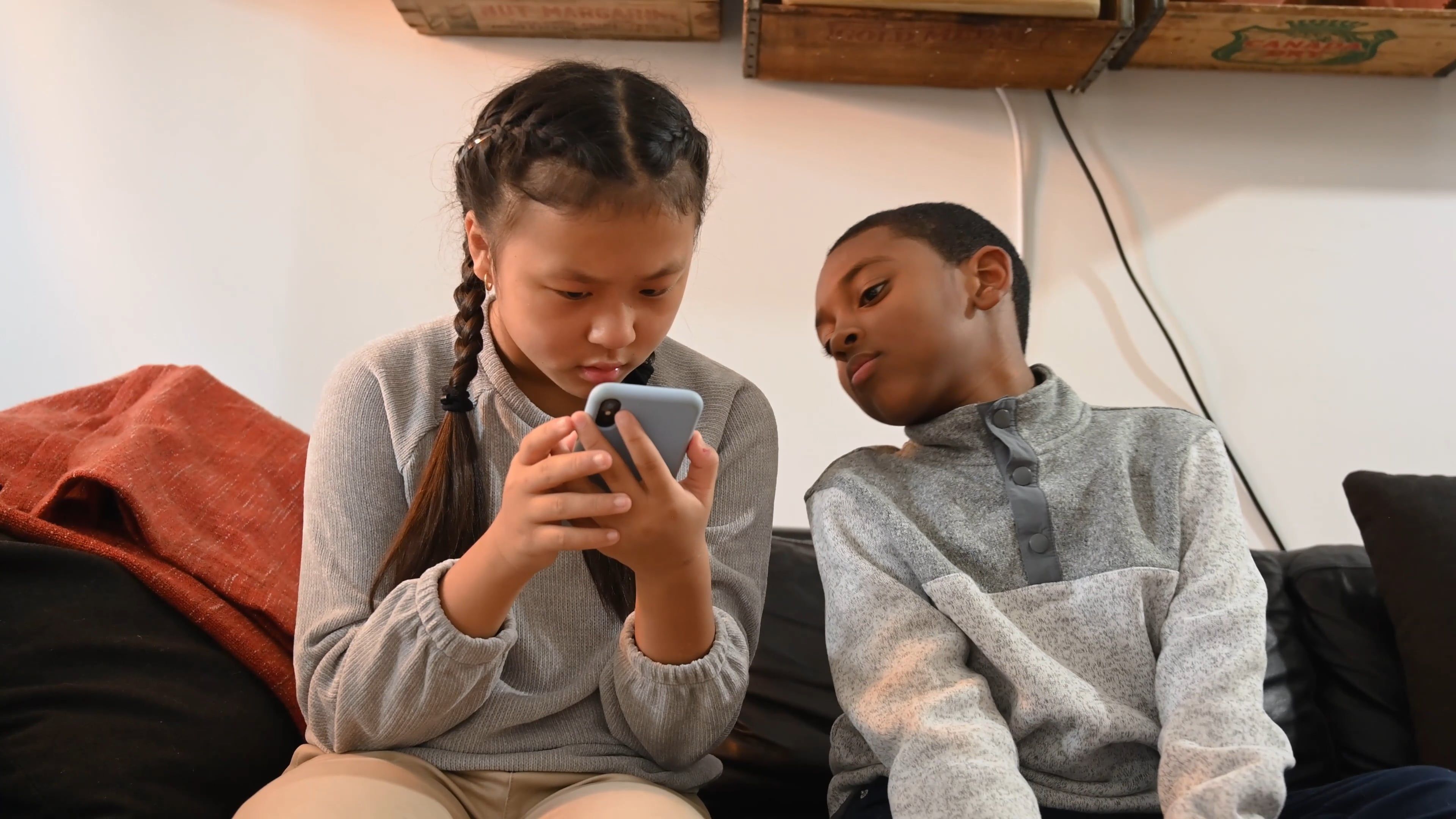 kids-watching-on-a-smartphone-free-stock-video