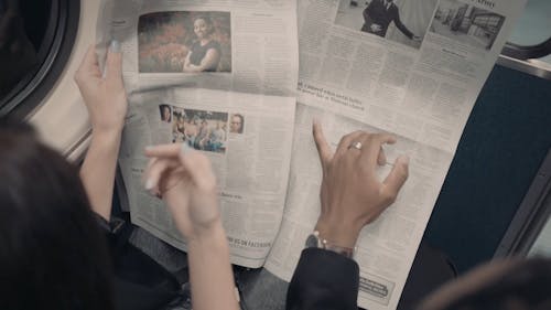 People reading the Newspaper 