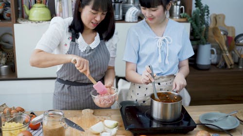 Mom and Daughter in the Kitchen 