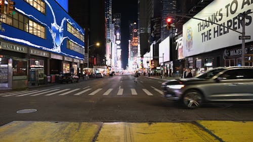 People Crossing a Pedestrian Lane