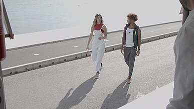 people walking while chatting