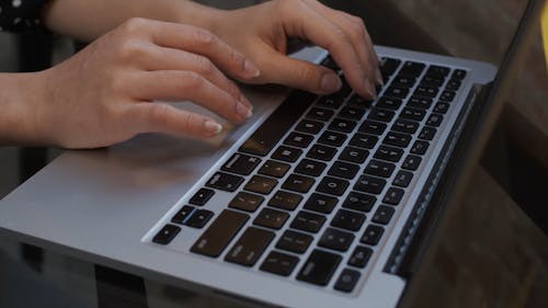Close-Up Video Of Person Using Laptop