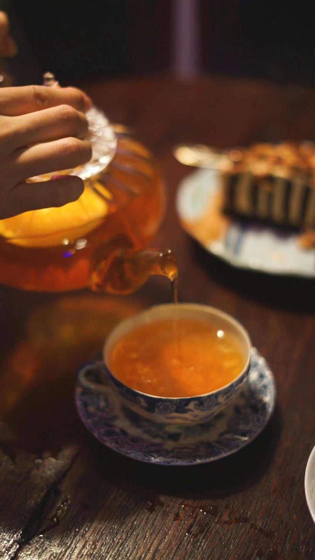Pouring Blue Tea on a Glass Teacup · Free Stock Video