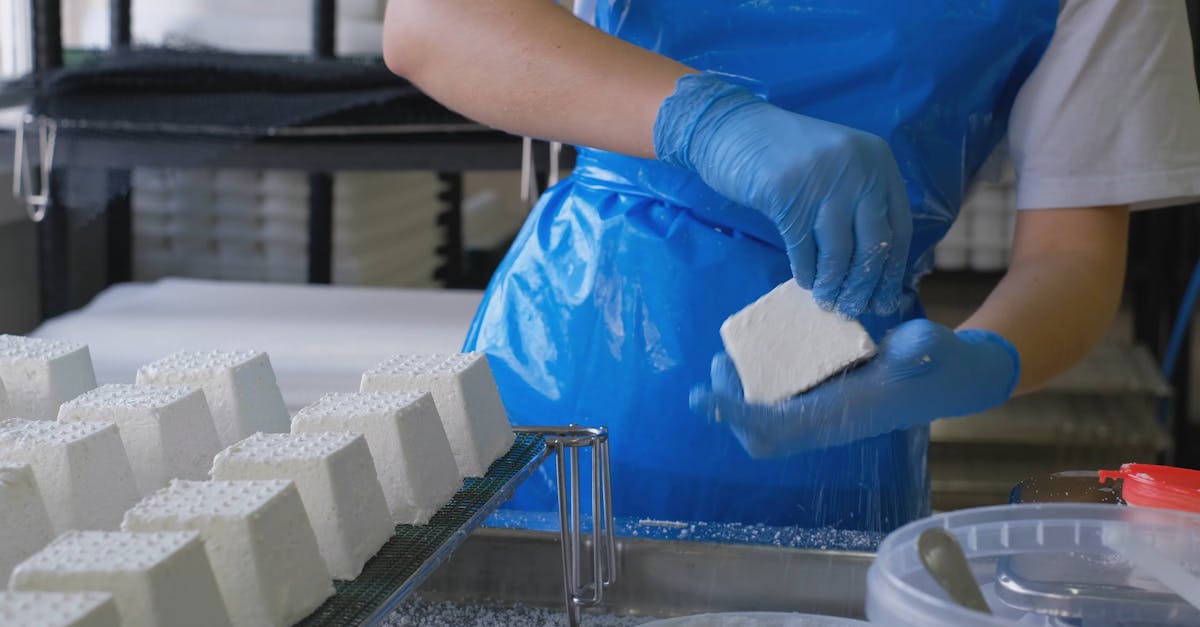 A Footage of a Person Sprinkling Powder on a Molded Cement Free Stock ...
