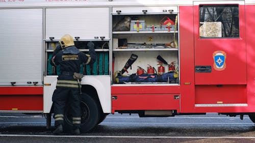 Firefighter Working on a Fire Truck