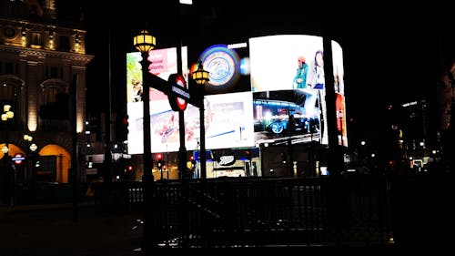 Electronic Billboard Lighting Up The Street In London At Night 