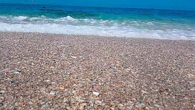 view of the waves splashing on the seashore