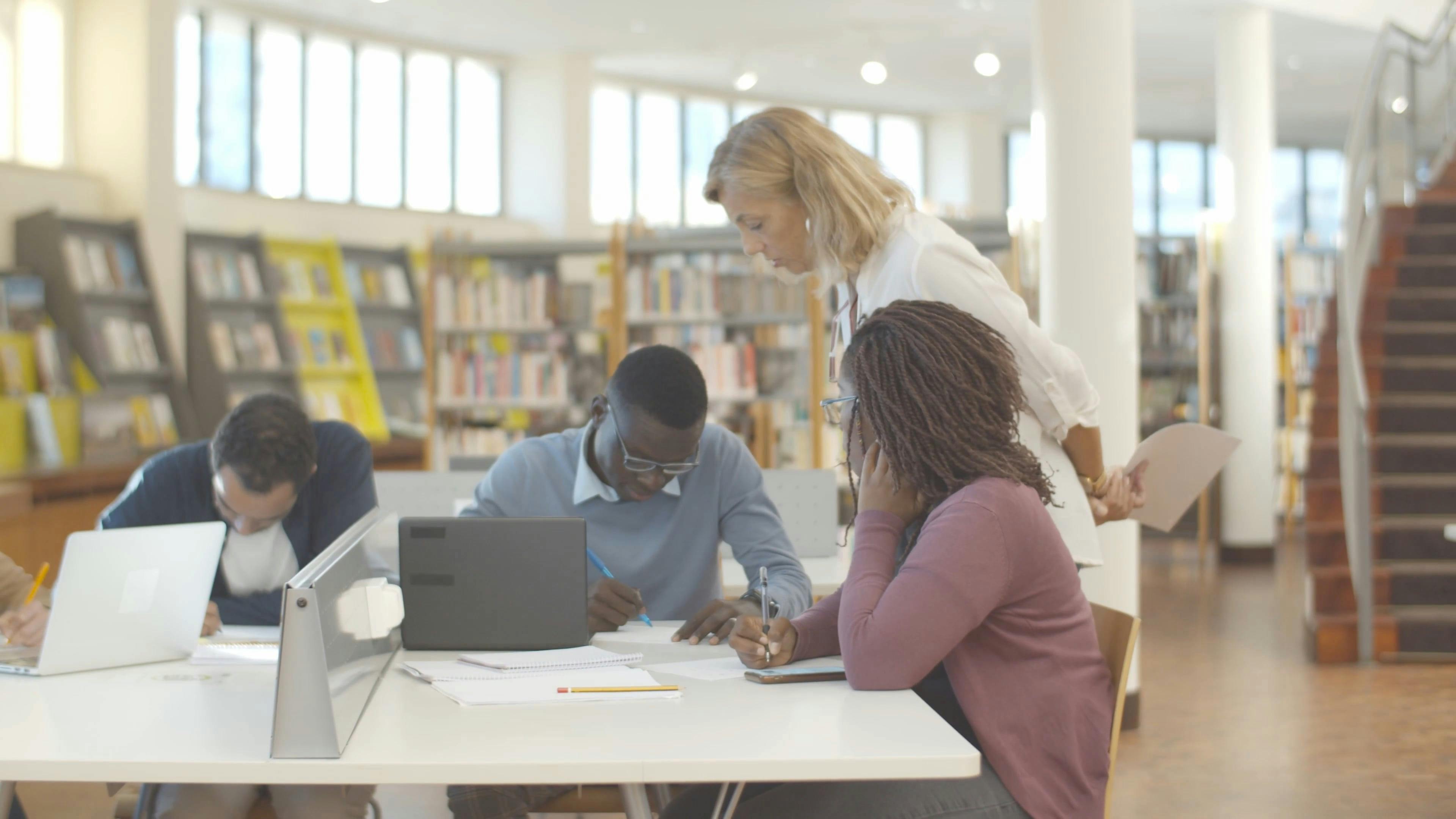 Teacher Evaluating her Students · Free Stock Video