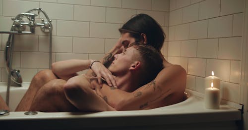 Couple Cuddling in the Bathtub