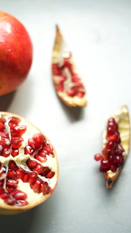 Fresh Pomegranates on a Table