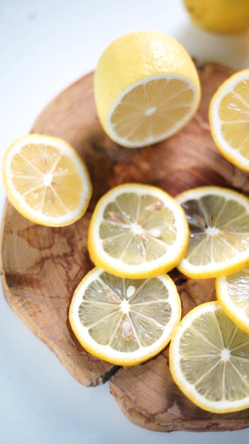 Close Up Video of Sliced Lemons on a Chopping Board