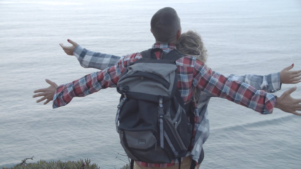 Couple Standing on a Cliff · Free Stock Video