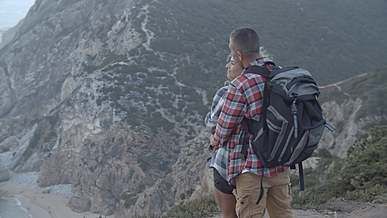 couple standing on a cliff
